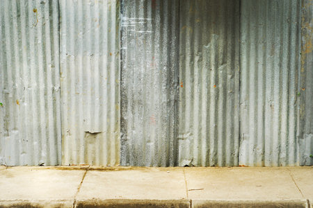 old grungy metallic wall and cement floorの写真素材
