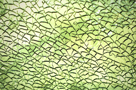 Background of cracked mirror texture, gradient bluredの写真素材