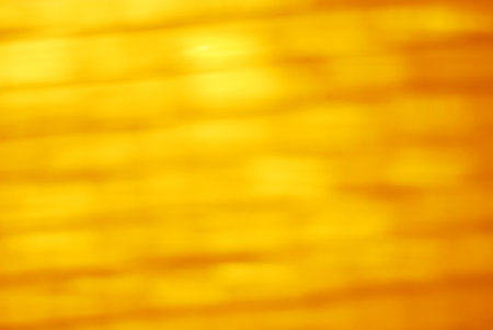 abstract background moving dark yellow bokehの写真素材