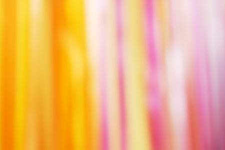 Blur Yellow and Pink Ribon backgroundの写真素材