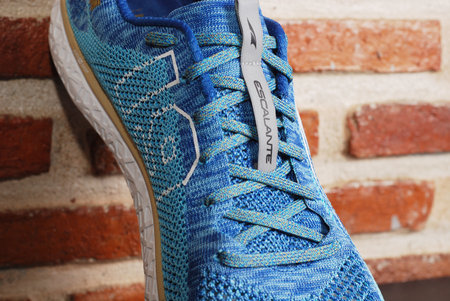 Nakhonpathom, Thailand - March 16, 2019 : Altra Men's Escalante Racer Boston 2019 Limited Edition. High performance running shoe's with grunge wall background. Running shoe's for Boston marathon 2019, One of six world major marathon.のeditorial素材