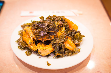 Shrimp and tea leaf fry chinese foodsの写真素材