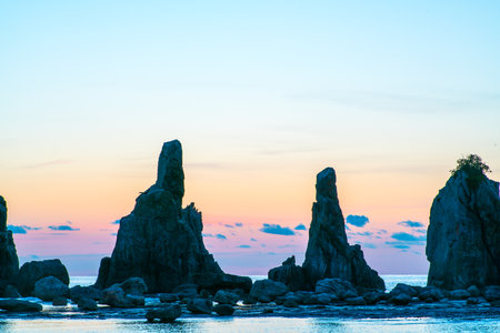 breaking dawn of Hashikuiiwa rock, Kushimoto area, wakayama, japanの写真素材