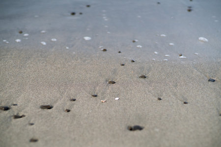 beach sand and rocksの写真素材