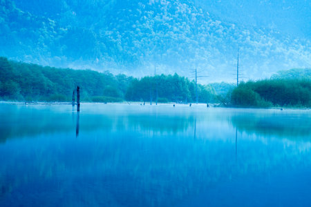Early morning at spring Kamikochi Taisho-ike pond,nagano,japanの写真素材