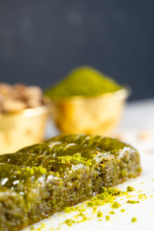 Pistachio baklava on white marble. Traditional middle eastern dessert. Turkish Antep baklava.の写真素材