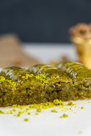 Pistachio baklava on white marble. Traditional middle eastern dessert. Turkish Antep baklava.の写真素材