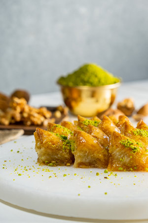 Walnut baklava on white marble. Traditional middle eastern dessert. Turkish Antep baklava.の写真素材