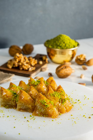 Walnut baklava on white marble. Traditional middle eastern dessert. Turkish Antep baklava.の写真素材