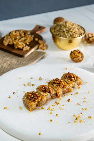 Walnut baklava on white marble. Traditional middle eastern dessert. Turkish Antep baklava.の写真素材