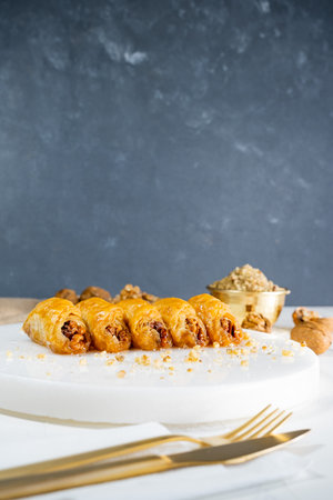 Walnut baklava on white marble. Traditional middle eastern dessert. Turkish Antep baklava.の写真素材