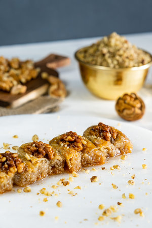 Walnut baklava on white marble. Traditional middle eastern dessert. Turkish Antep baklava.の写真素材