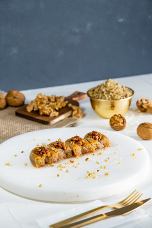 Walnut baklava on white marble. Traditional middle eastern dessert. Turkish Antep baklava.の写真素材