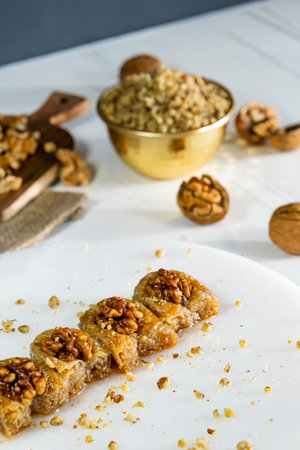 Walnut baklava on white marble. Traditional middle eastern dessert. Turkish Antep baklava.の写真素材
