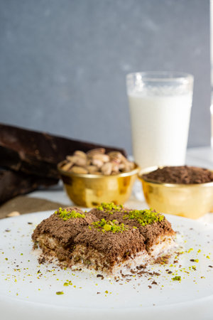 Pistachio cold baklava on white marble. Traditional middle eastern dessert. Turkish Antep baklava.の写真素材