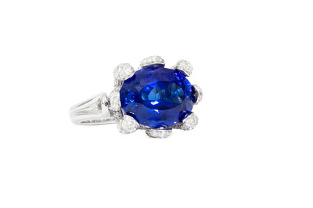 Designer Ring with Tanzanite Stone surrounded with Diamonds, Isolated on White Backgroundの写真素材