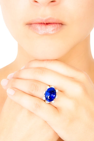 Closeup of a Model Wearing a Tanzanite Designer Ring, Isolated on Whiteの写真素材