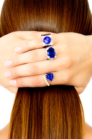 Closeup of a Model Wearing Tanzanite Designer Rings, Isolated on Whiteの写真素材