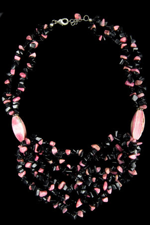 Necklace with Pink and Black Stones, on Black Backgroundの写真素材