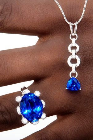 Tanzanite and Diamonds Designer Jewellery on the Hand of a Black Ladyの写真素材