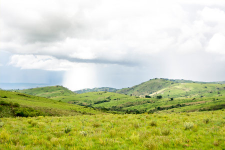 Beautiful Mountains of Nyika Plateau under Stormy Clouds, Malawi, Africaの写真素材