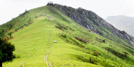 Vehicle in Rainy Weather at Jalawe Rock, Nyika Plateau, Malawi, Africaの写真素材