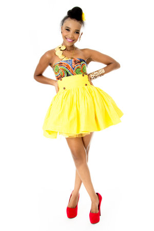 Full-Length Picture of Beautiful African Model Wearing a Modern Traditional Designer Dressの写真素材