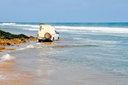 Adventurous, Off-Road Driving Around the Rocks on the Acre of Death Along the Coast of Angola, Southern Africaの写真素材