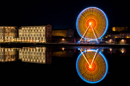 Ferris wheel on the river Garonneの写真素材