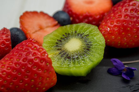 Skewer of kiwi and strawberriesの写真素材