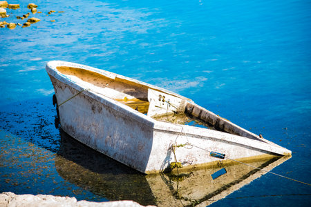 Abandoned boat on the lakeの写真素材