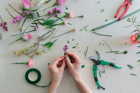 Floristics hobby and work. Floral bouquet making process.の写真素材