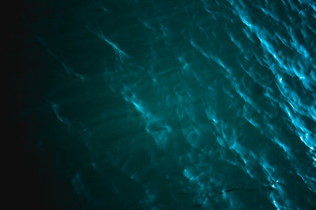 Black sea texture. Turquoise dark sea water with ripple. Peaceful nature minimal conceptの写真素材
