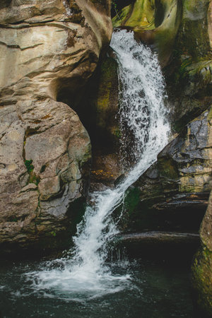 Beautiful landscape of waterfall among rocks in mountains. Nature conceptの写真素材