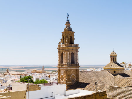Church and tower of the Merced in Osuna, Sevillaの写真素材