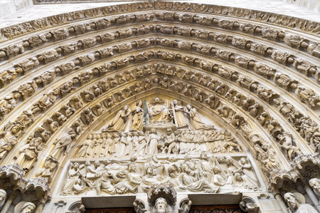 Entrance arch in the cathedral of Notre Dame in Parisの写真素材