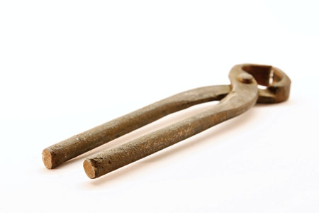 Old worn pliers on white backgroundの写真素材