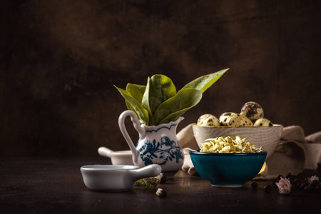 Horizontal photo of vintage wooden board with several bowls which contain mung bean sprouts, quail...