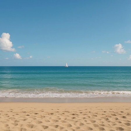 sailboat on the sea and sand on a background of blue sky