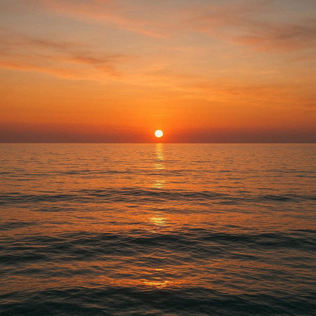 Beautiful sunset over the sea. The sun goes down over the sea.