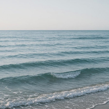 Beautiful seascape with waves and blue sky. Soft focus.