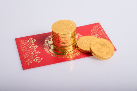 Gold ingot and red envelopesの写真素材
