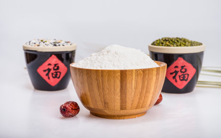 Flour, grains and red dateの写真素材