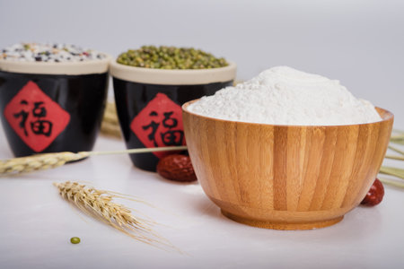 Flour, grains and red dateの写真素材