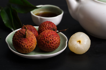 Lychee with tea potの写真素材