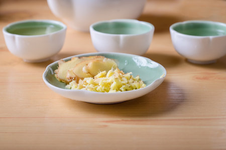 raw ginger with ginger teaの写真素材