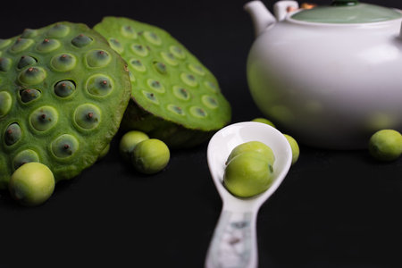 Lotus seed with tea potの写真素材