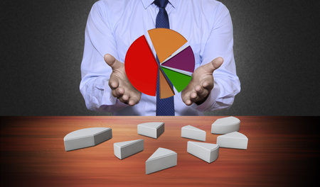 Hand holding a chartの写真素材