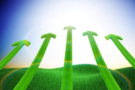 Green arrow and grasslandの写真素材