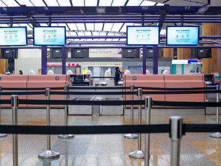 SINGAPORE - 4 OCT 2019 â€“ Frontal view of empty check-in counters at Singapore Changi Airport...